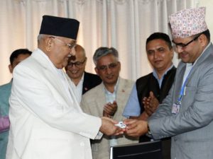 Nepal PM Oli Receives Biometric National ID Card
